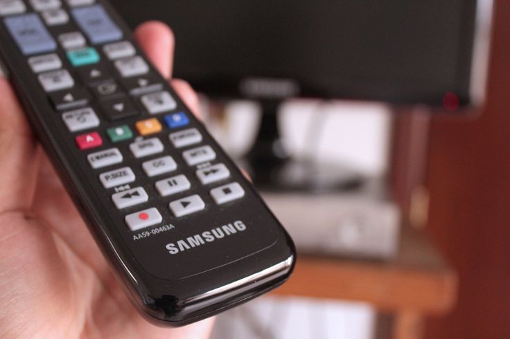 How do you program a TV remote without a code?